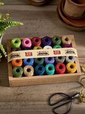 Multi-Colored Jute Twine in a Wooden Tray